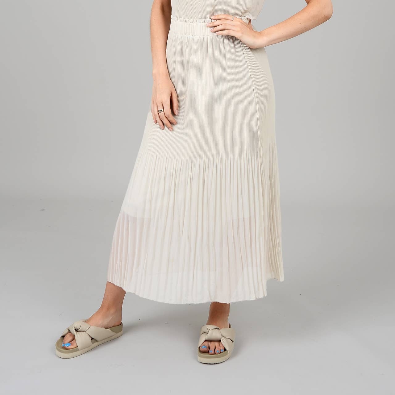 RELEASE PLEAT SKIRT